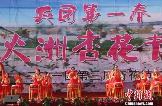 新疆兵团团场杏花怒放带动春季旅游发展
